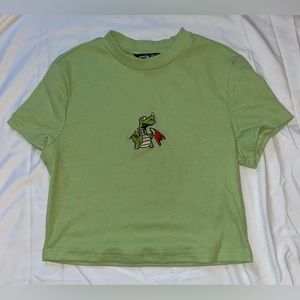 I am selling a green cropped t-shirt. It is a size medium.